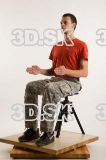 Sitting reference of whole body red shirt army jeans brown…